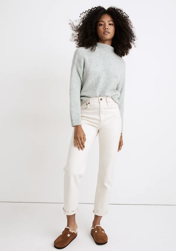 A mock neck sweater