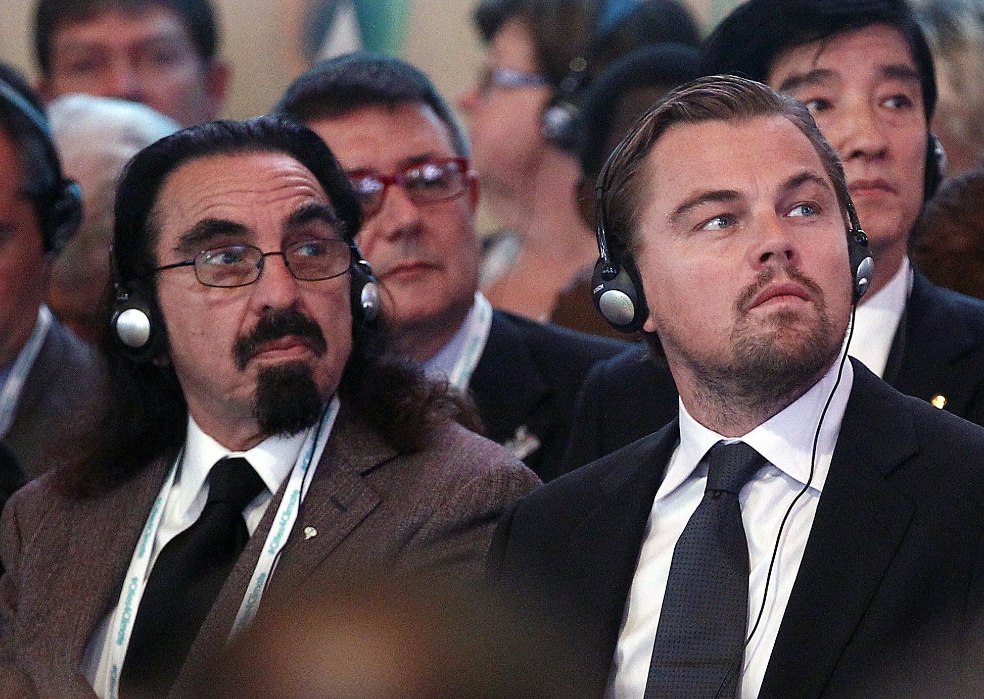 Leo and George sit together at an event
