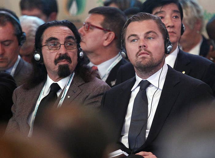 Leo and George sit together at an event