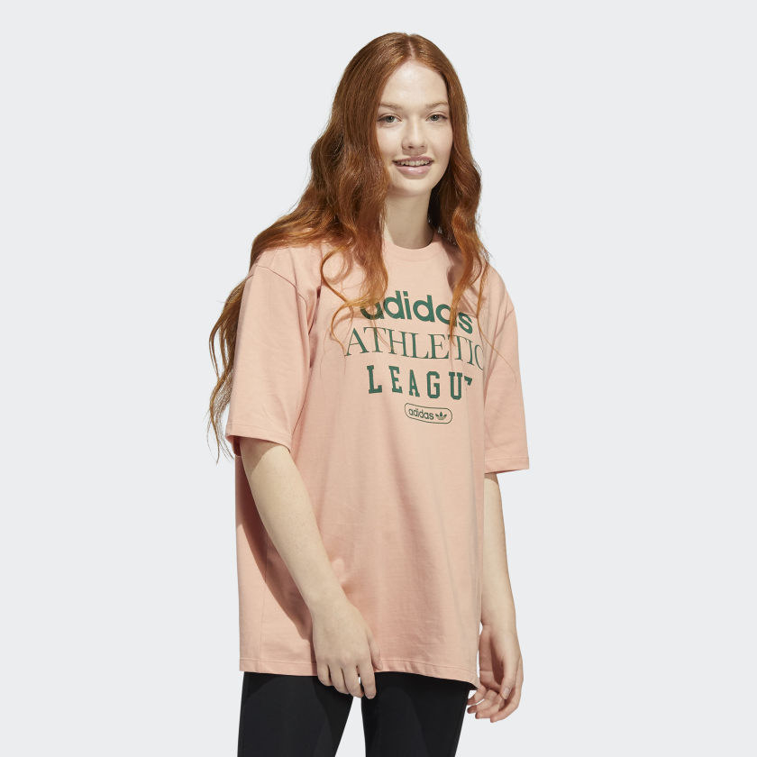 model wearing retro luxury T-shirt in blush