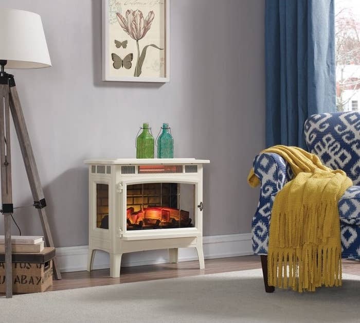 The small electric fireplace in a room