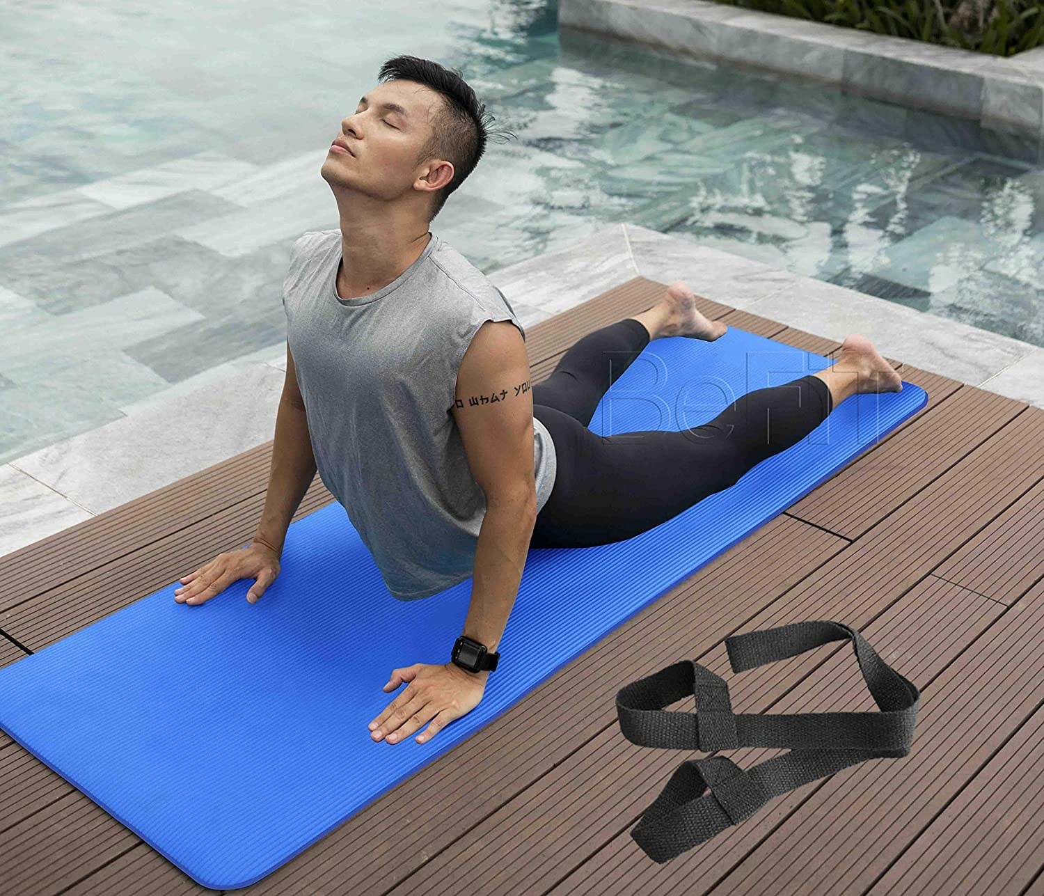A man doing a yoga pose on a mat