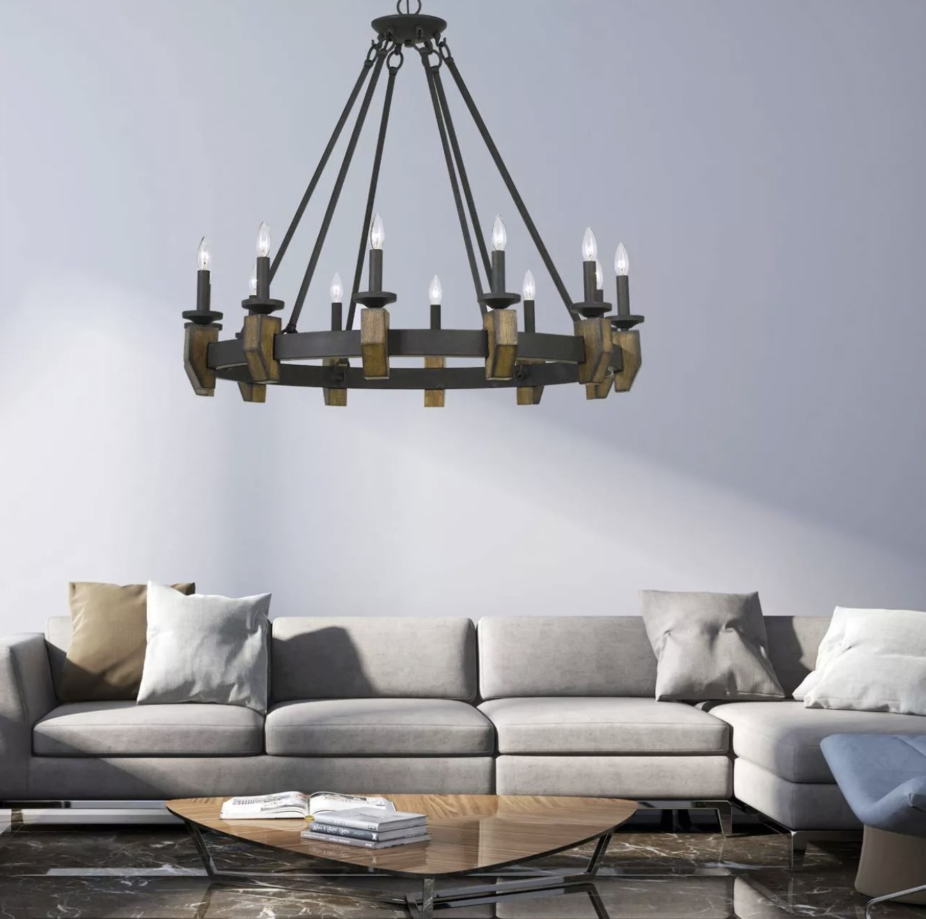 The metal and wood chandelier hanging in a living room