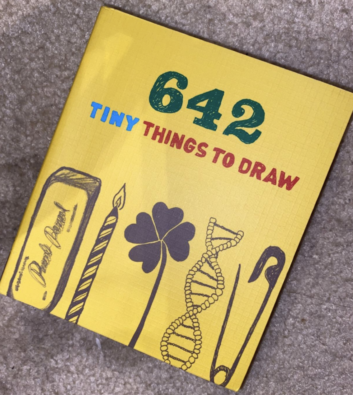 A customer review photo of the 642 Tiny Things To Draw book
