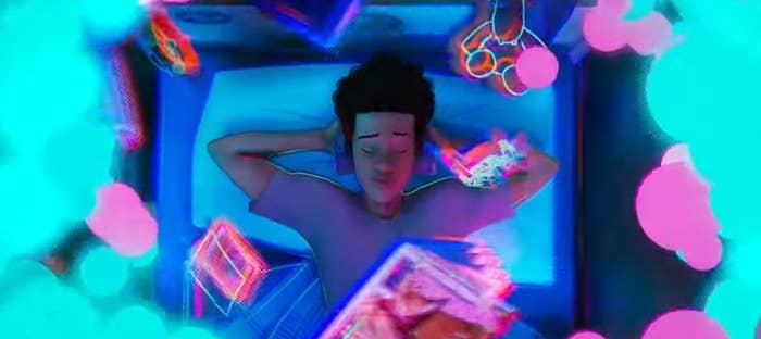 Miles lying on his bed, listening to music with his headphones, when a portal appears above him in &quot;Spider-Man: Across the Spider-Verse (Part One)&quot;