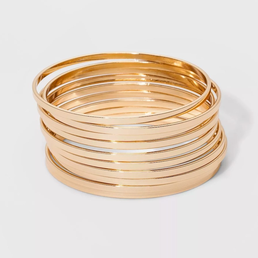 Stack of gold bracelets