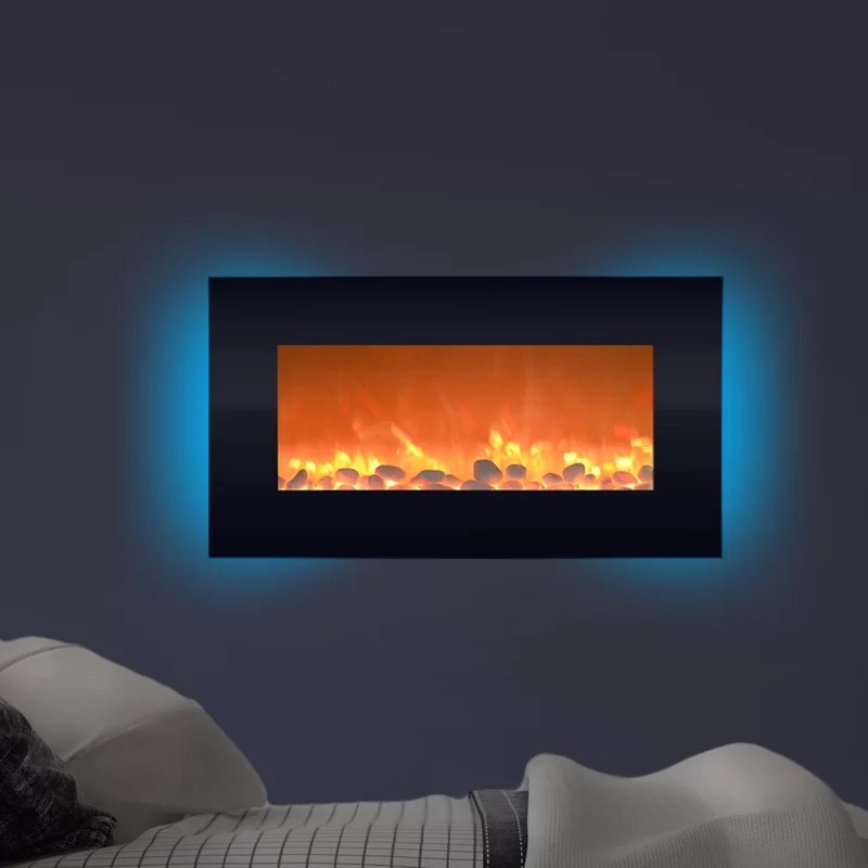 A wall mounted fireplace with a backlight