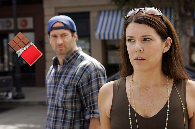 luke and lorelai with a chocolate bar next to them