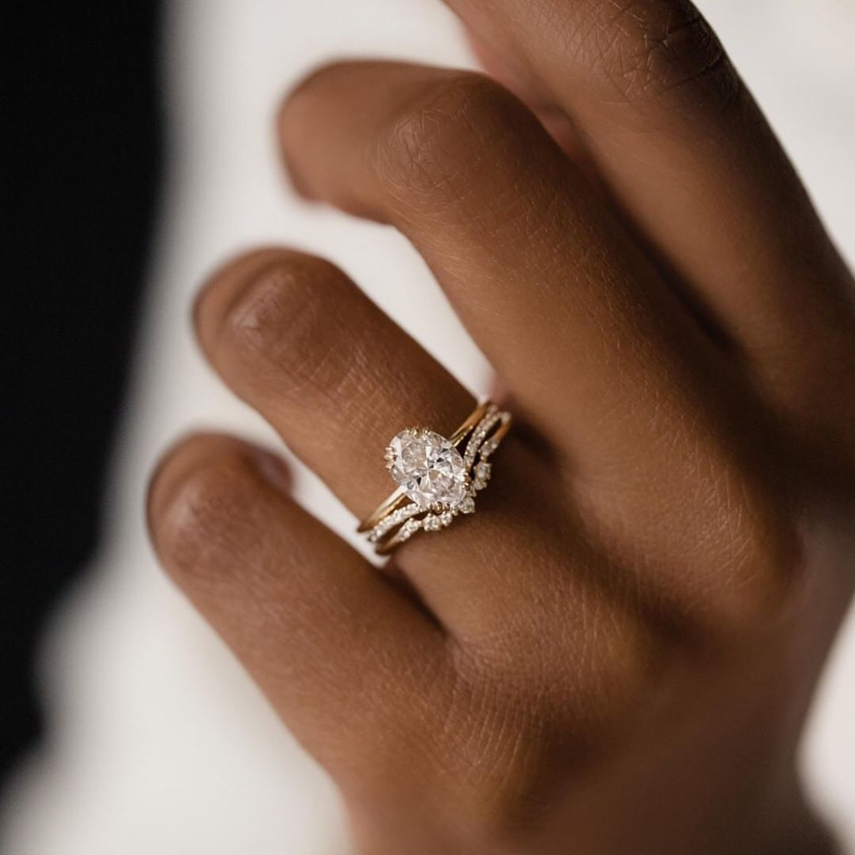 A bride shows off a big diamond ring