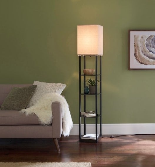 floor lamp whose base is a series of small vertical shelves