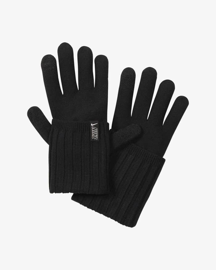 A pair of black knitted gloves