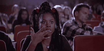 Regina Hall in Scary Movie licking fingers