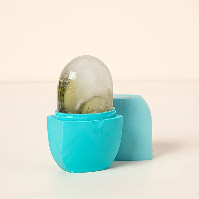 round ice orb with cucumber in a plastic holder