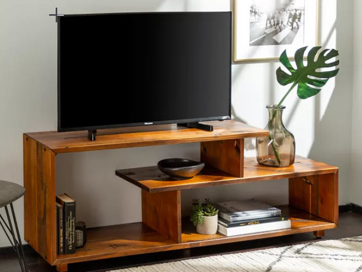 A glossy wooden brown TV stand with open shelves with multiple levels. Uniquely designed and aesthetically pleasing!