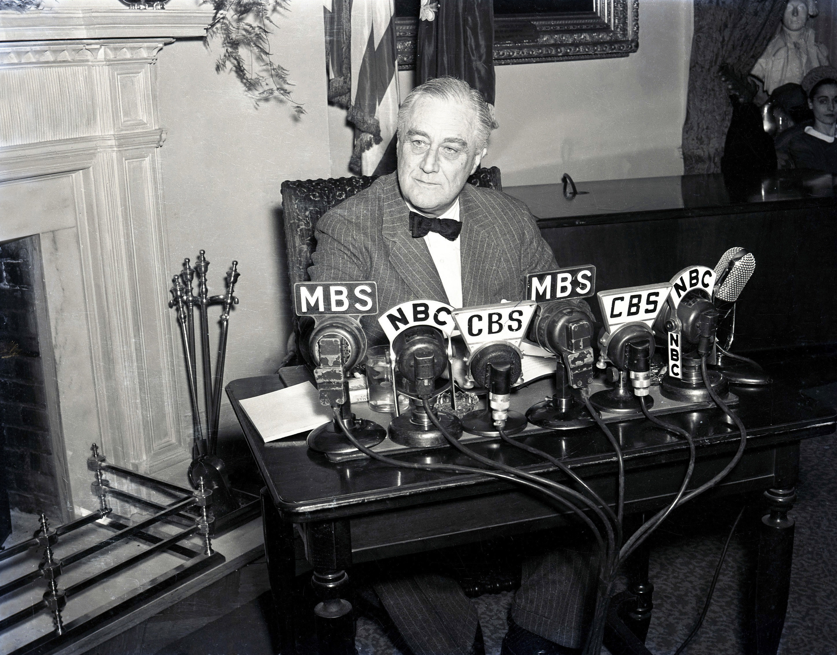 FDR addressing the nation on the radio