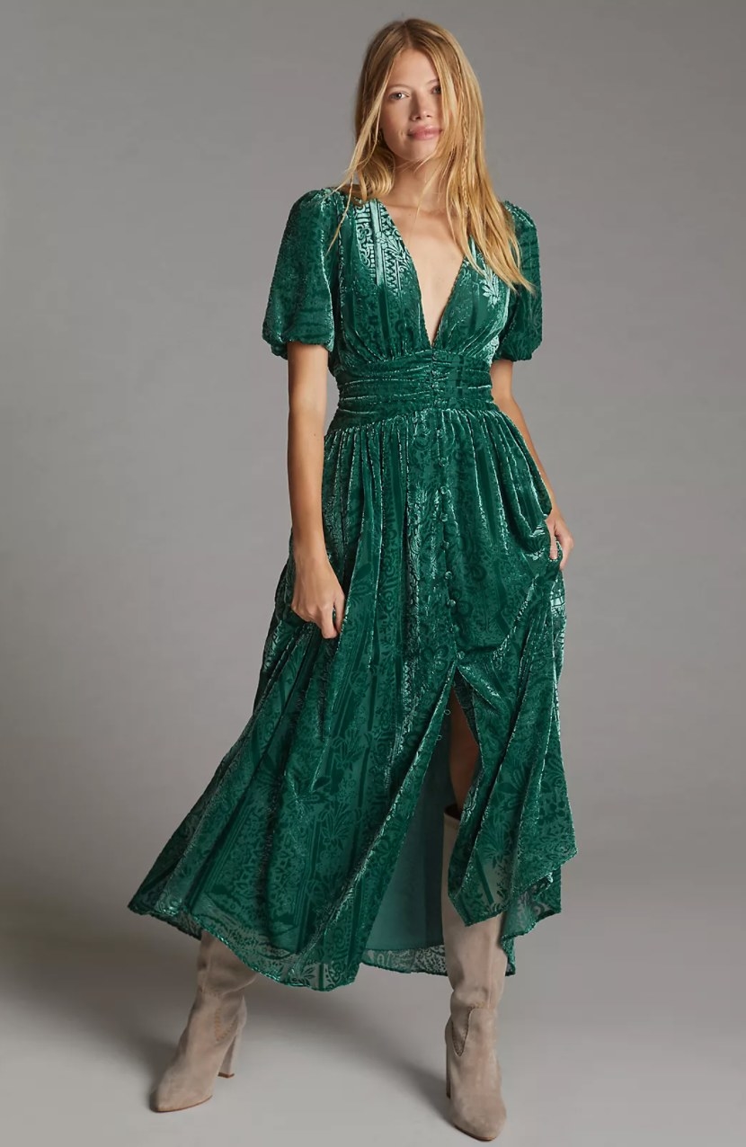 The emerald green velvet midi dress