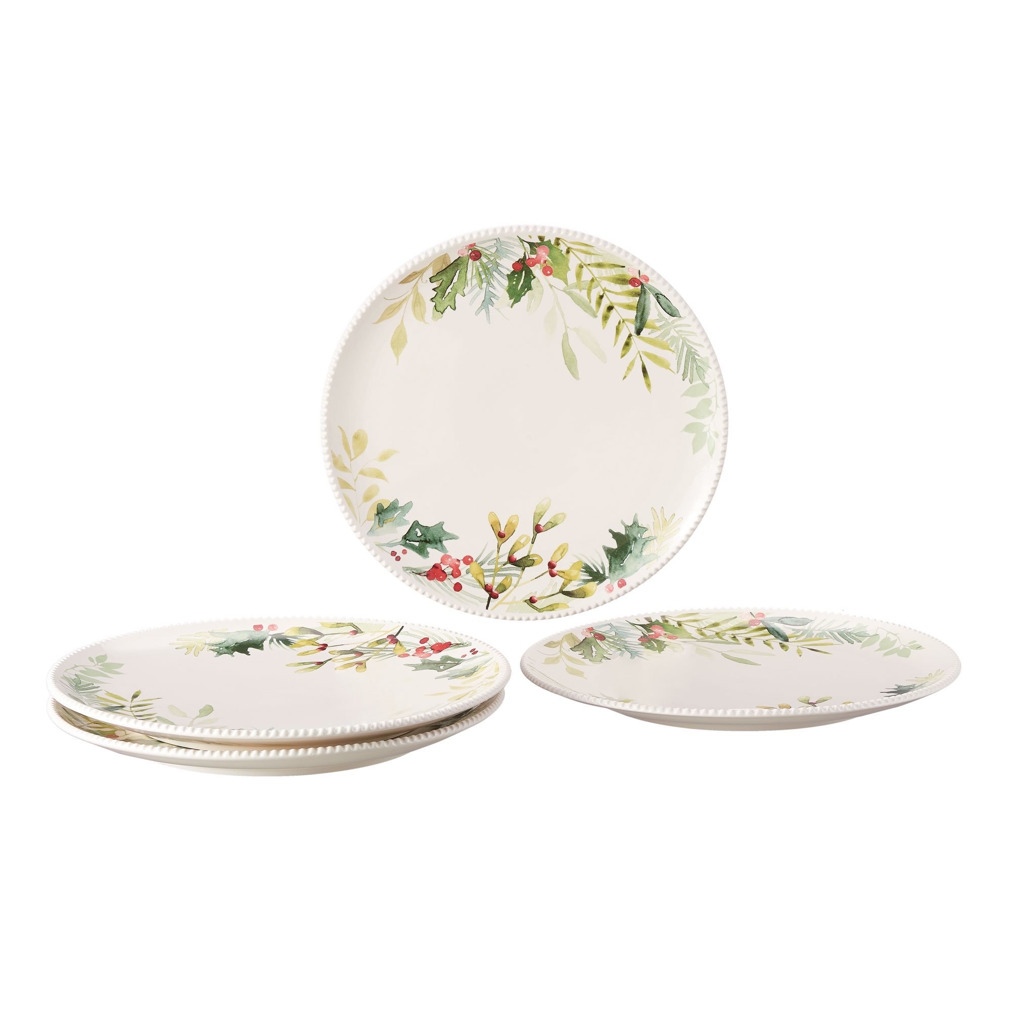 Four holiday plates: on the left, two are stacked on top of each other; on the right, one rests by itself; behind them, one is tilted toward the camera on display