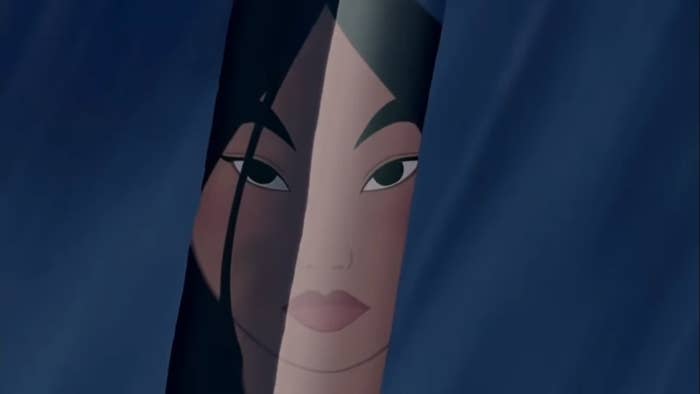 Mulan reflected in a sword