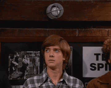 gif of Eric in that 70s show raiding his eyebrow as a light turns on over his head