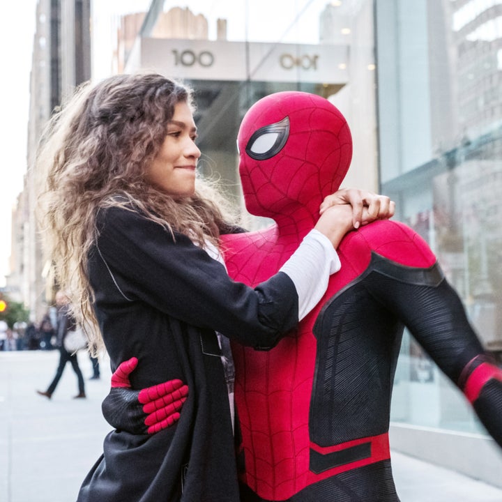 Peter / Spider-Man holding on to MJ