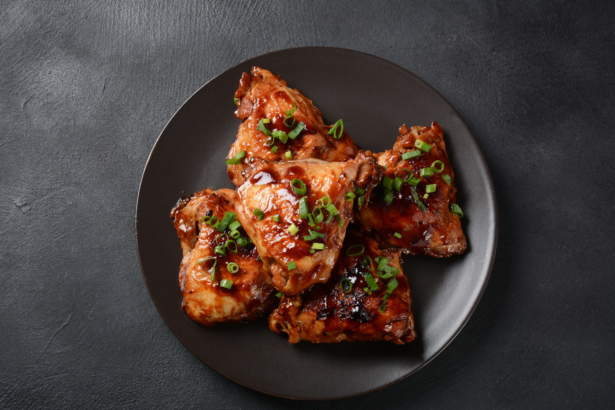 Marinated chicken thighs.