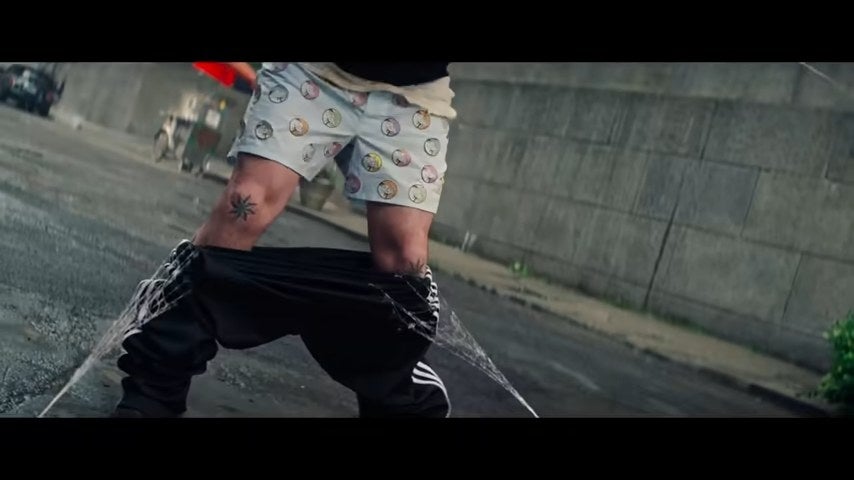Alexei with pants pulled down by Spider-Man's webs, revealing underwear with rhinos on it, in "The Amazing Spider-Man 2"