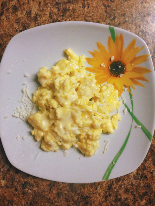 Scrambled eggs on a plate.