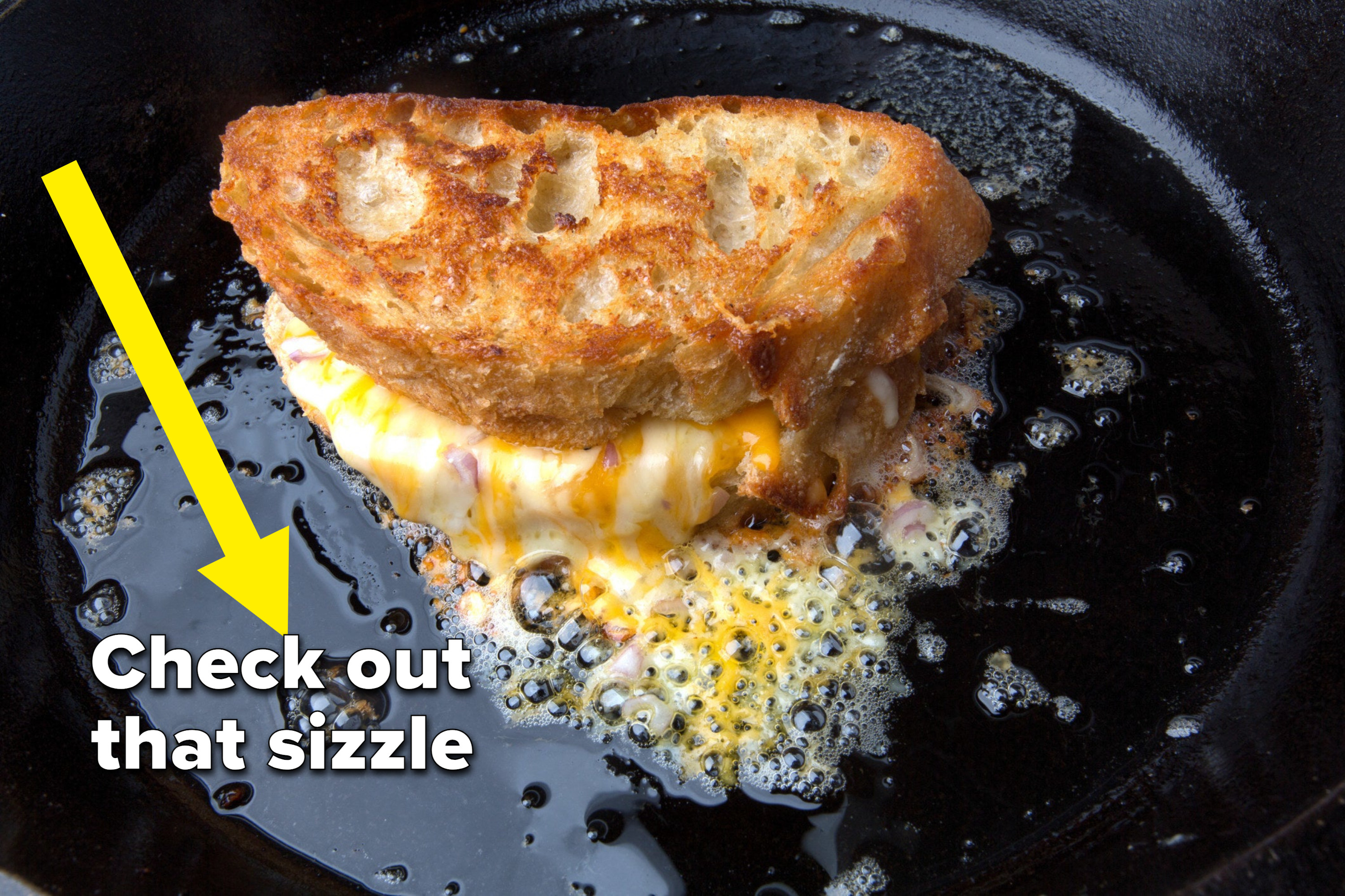 Fancy grilled cheese sandwich in a pan.