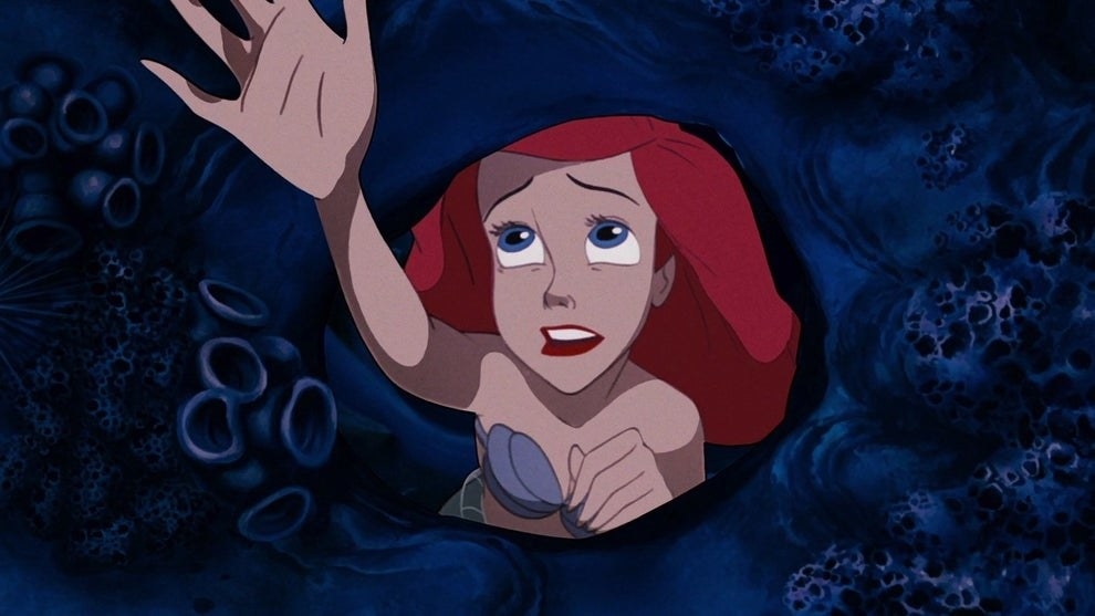 Ariel reaching out from the top of her sea cave