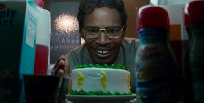 Max Dillon looking down on a green and yellow cake in his fridge in &quot;The Amazing Spider-Man 2&quot;