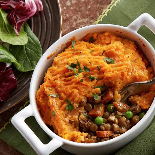 casserole dish filled with Shepard&#x27;s pie with mashed sweet potato