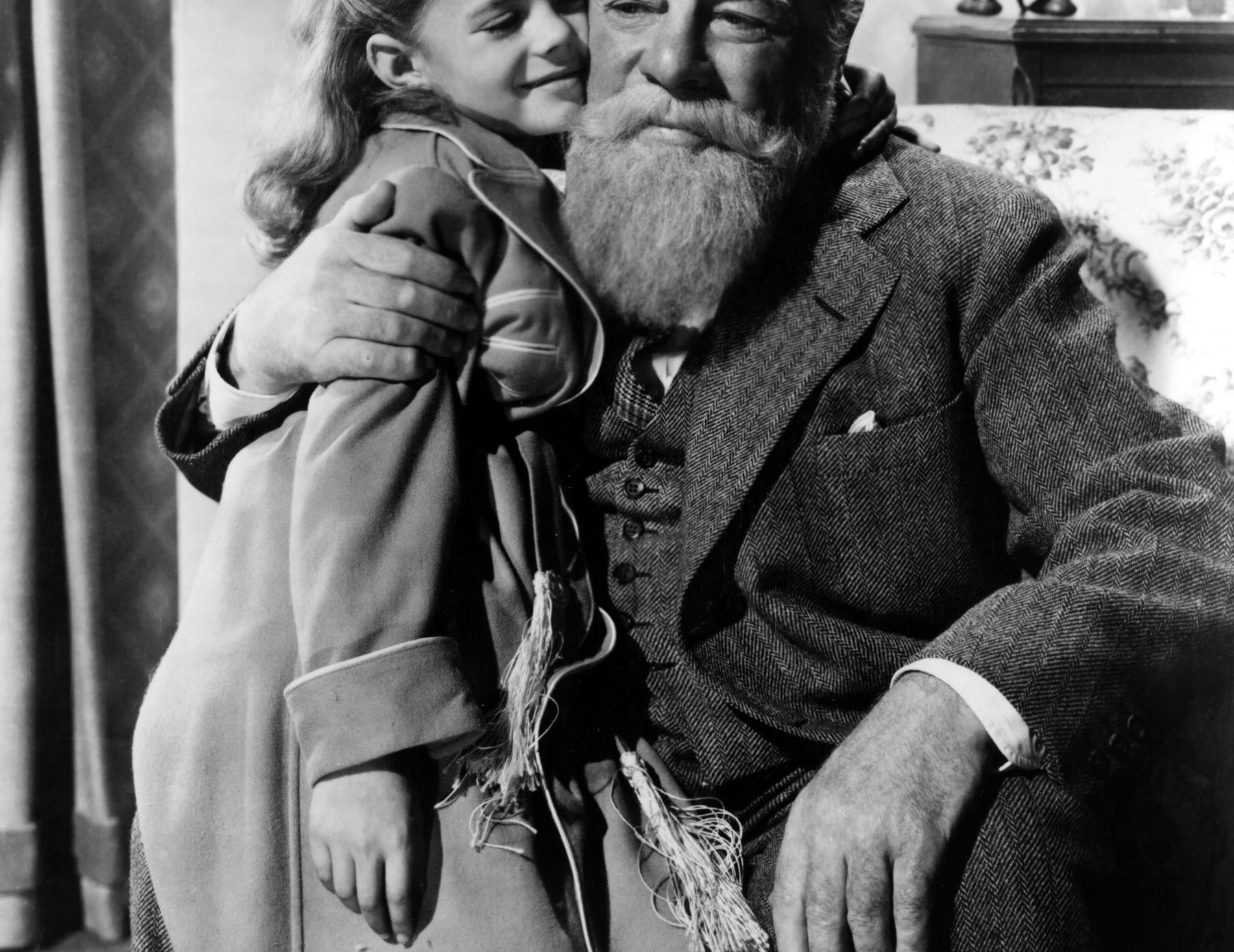 A young girl hugs Santa in &quot;Miracle on 34th Street&quot;