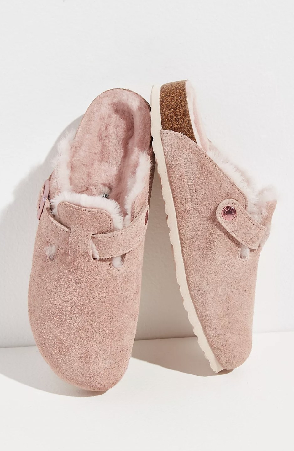 The pink shearling clogs