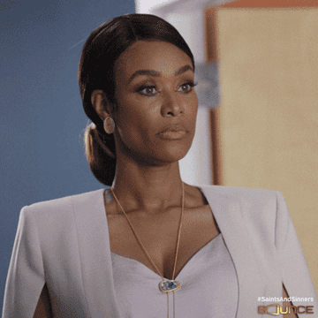 tami roman in &quot;saints and sinners&quot; looking someone up and down