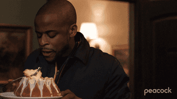 dulé hill as gus on &quot;psych&quot; slapping shawn&#x27;s hand away from a plate of cake he is eating