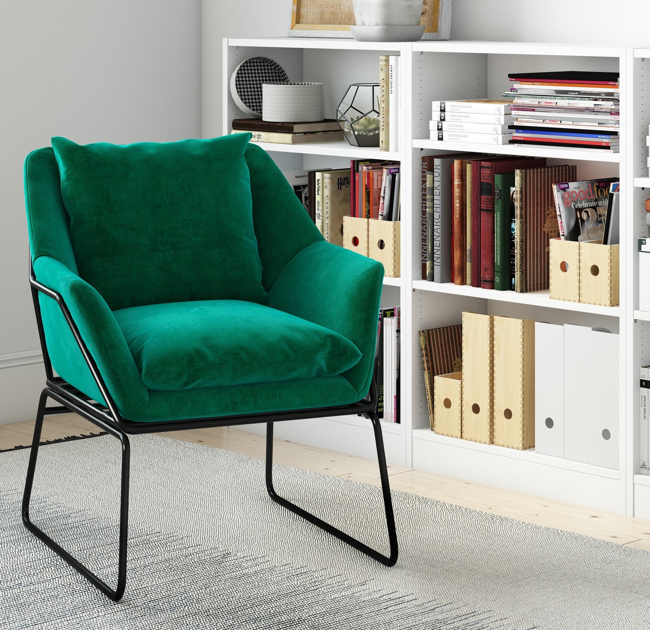 green velvet accent chair with black frame and legs