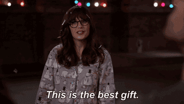 GIF of Jess from &quot;New Girl&quot; saying &quot;this is the best gift&quot; while standing outside in snow