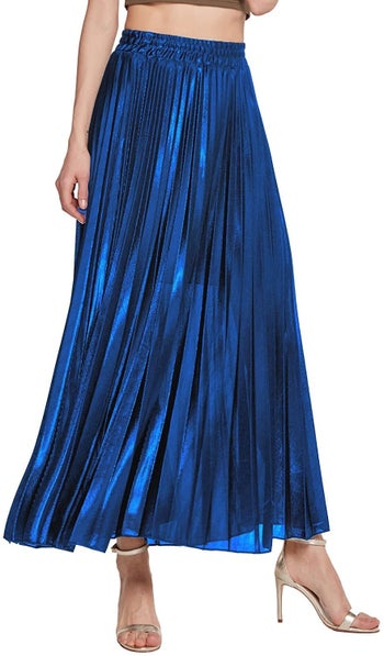 model in blue metallic pleated maxi skirt
