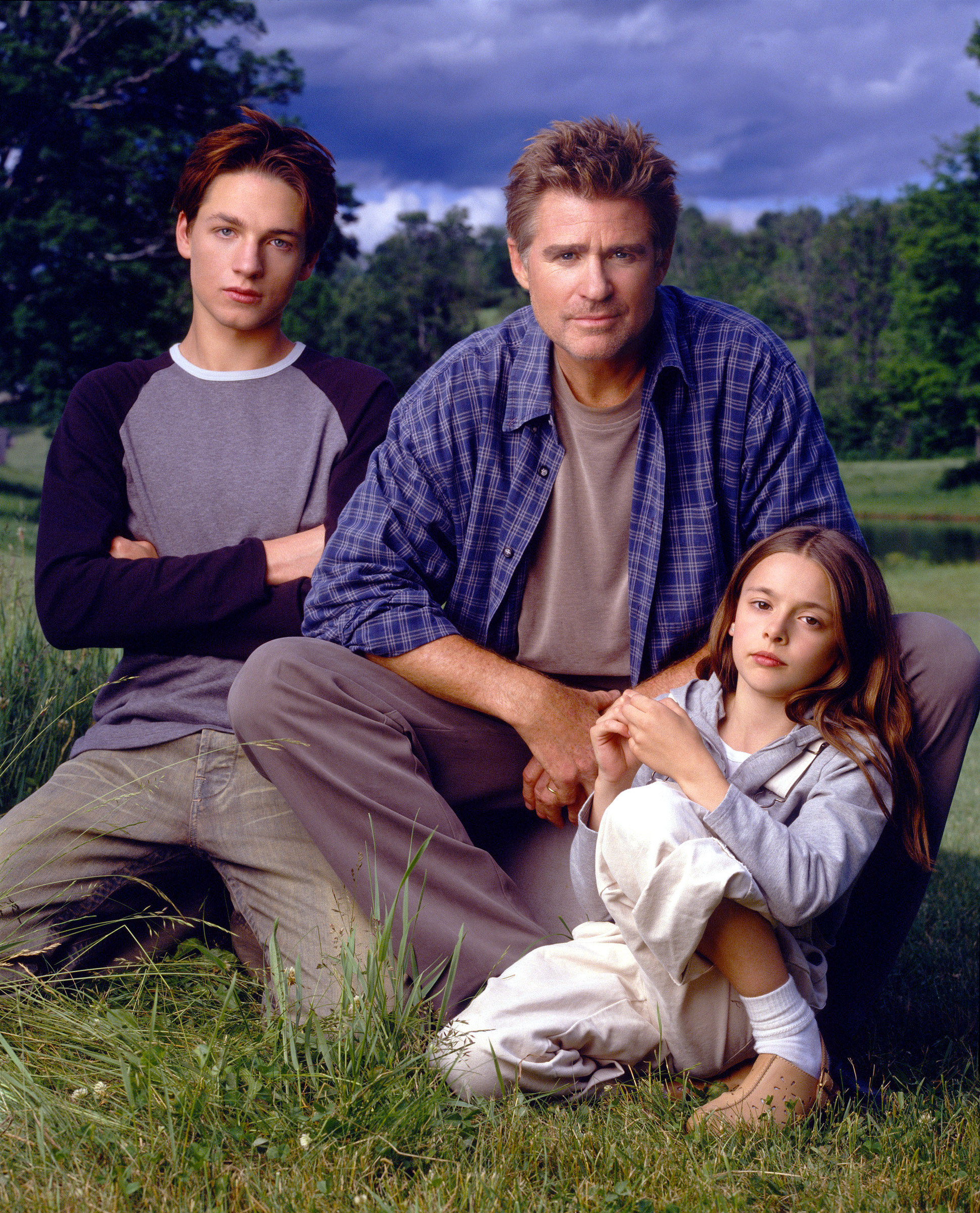 Actors Gregory Smith, Treat Williams, and Vivien Cardone in a promotional photo for season 1 of &quot;Everwood&quot;