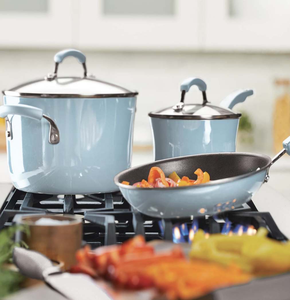 Three light blue cookware items, a pan, a sauce pot, and a smaller pot