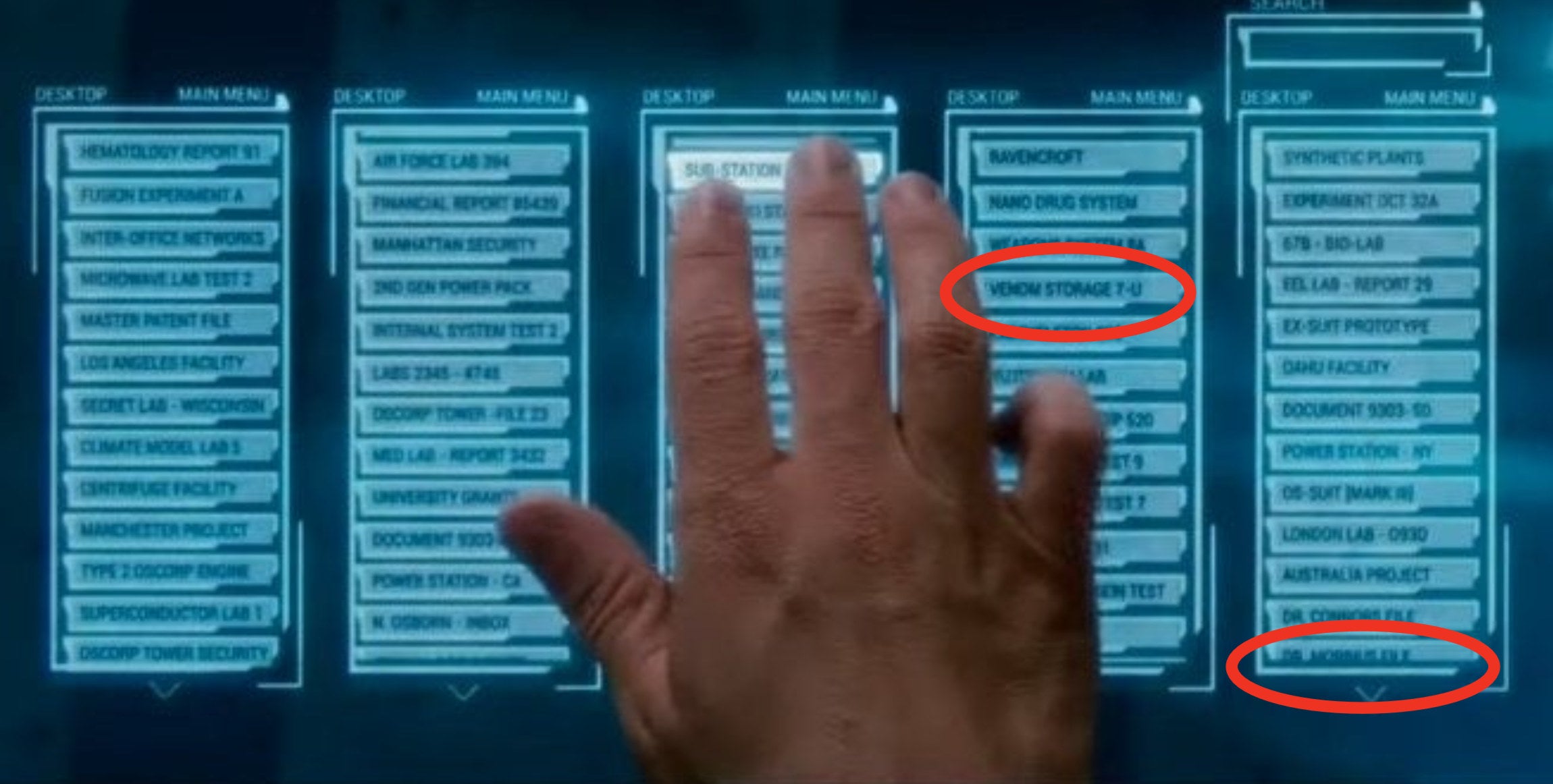 Harry looking through his father&#x27;s secret files on a computer touch screen in &quot;The Amazing Spider-Man 2&quot;
