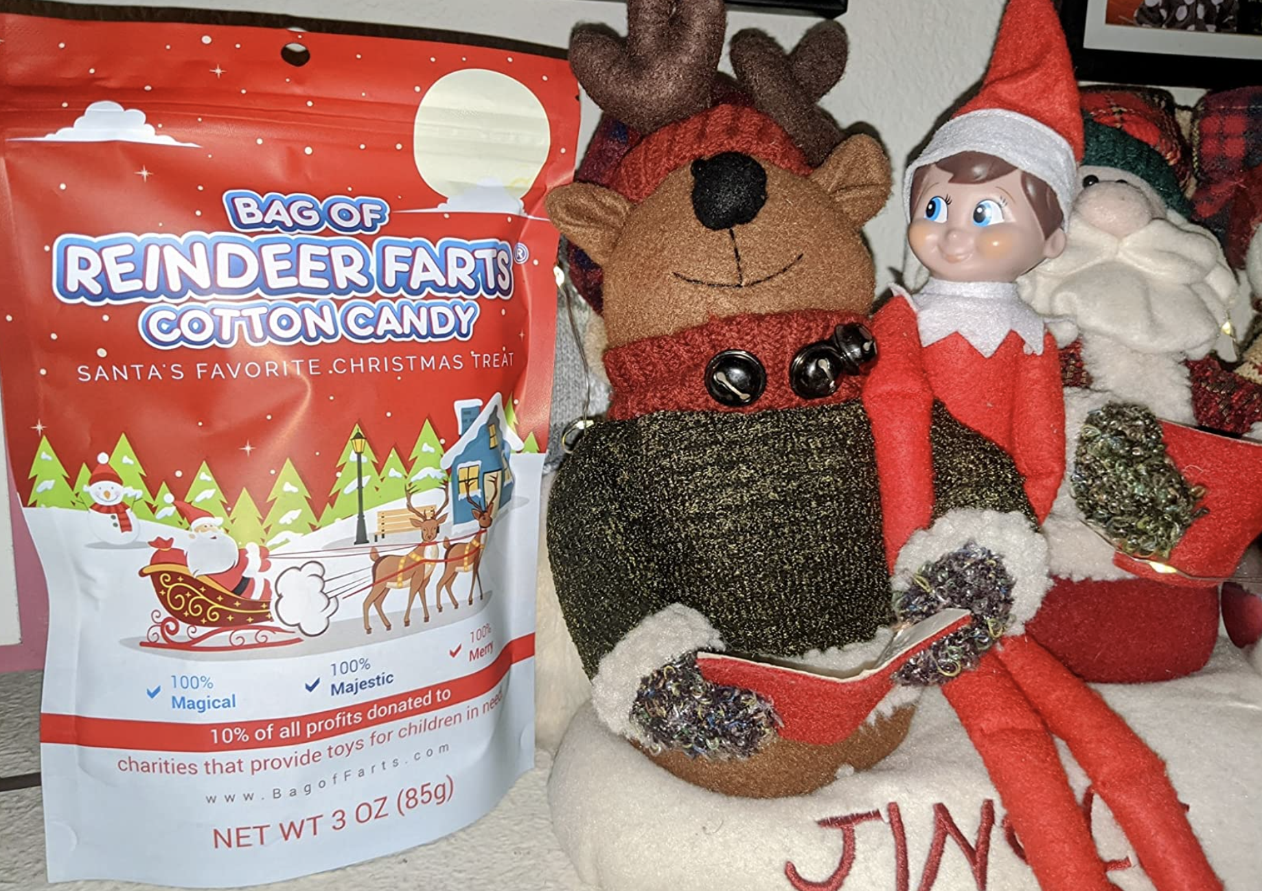 A customer review photo of the bag of cotton candy next to their Elf On The Shelf