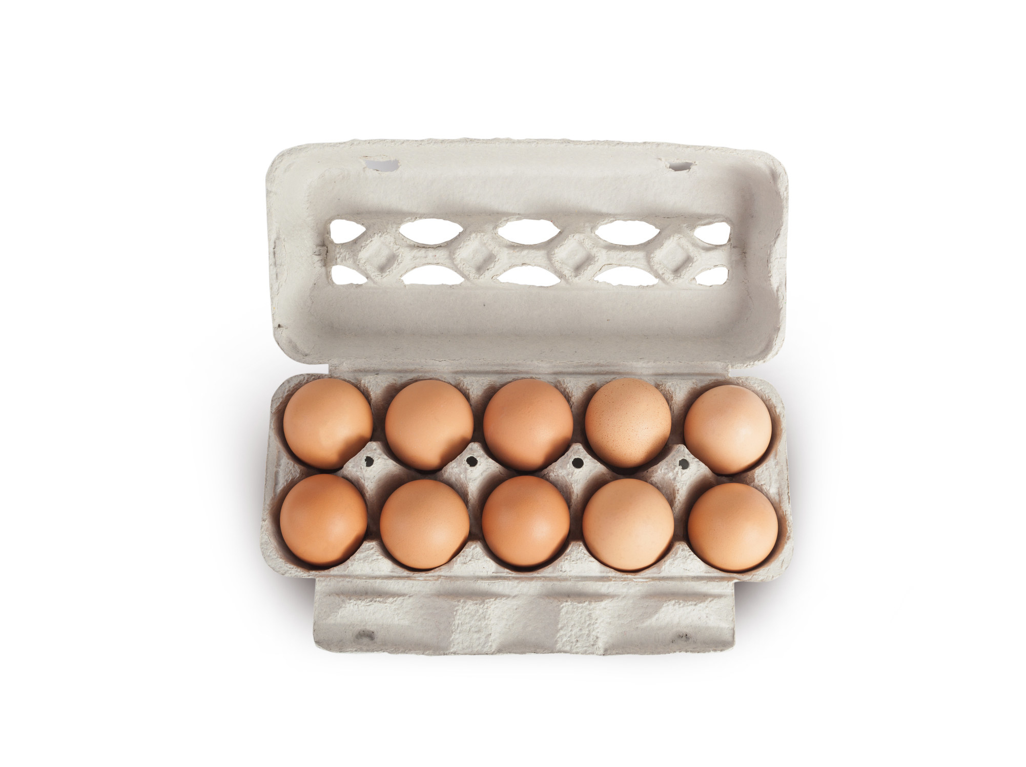 An open carton of brown eggs