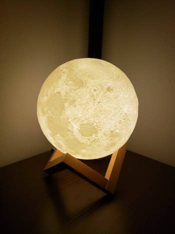 A BuzzFeed staffer's photo of the moon lamp lit up