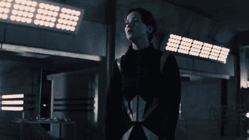 Katniss Everdeen bowing before the game makers
