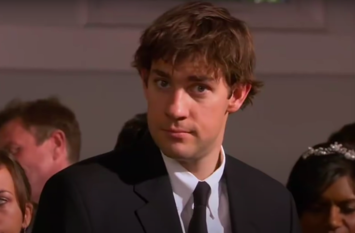 Jim from The Office looking at the camera in confused amusement