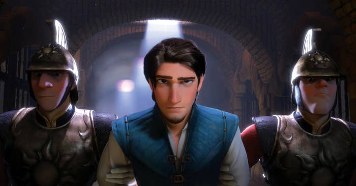 Flynn Rider is taken somewhere by guards