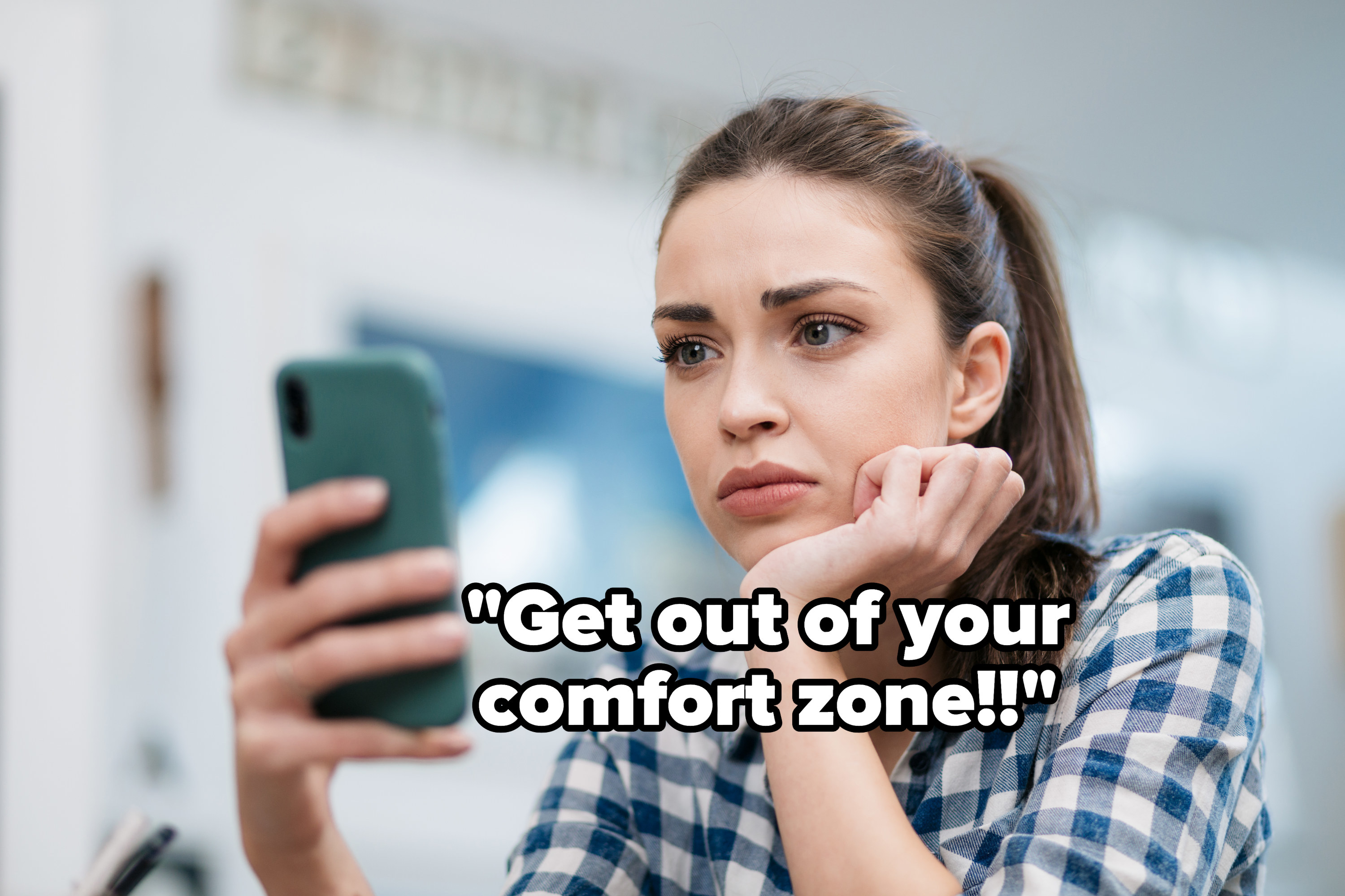 Woman&#x27;s phone yelling at her to get out of her comfort zone