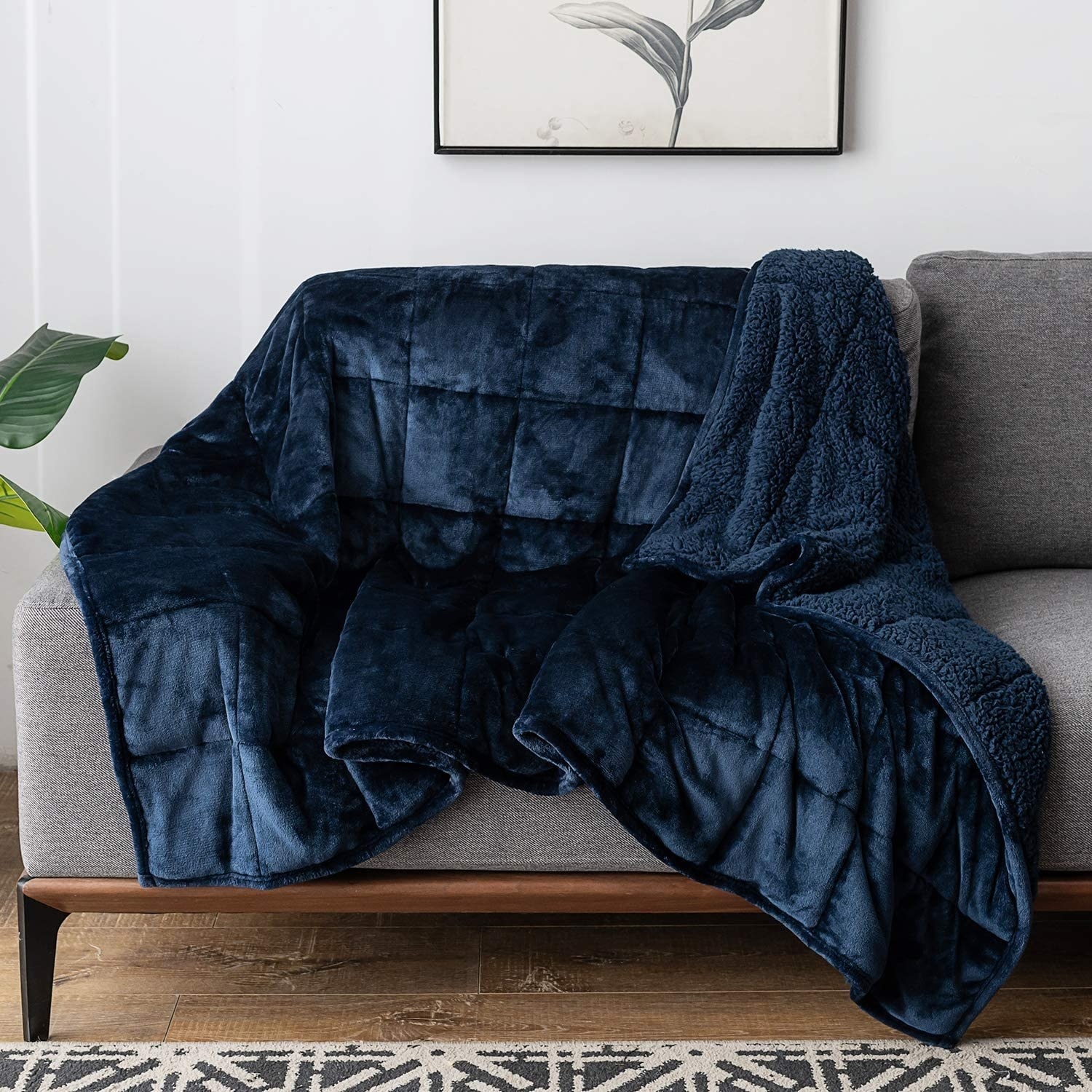 A weighted blanket draped over a couch