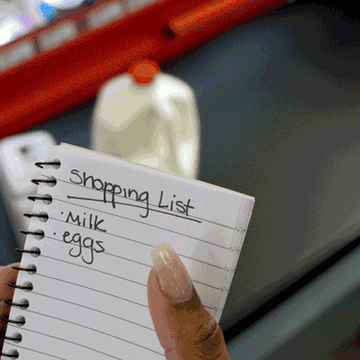 shopping list reads just &quot;milk, eggs&quot; but in the background dozens of items fly by on the checkout belt